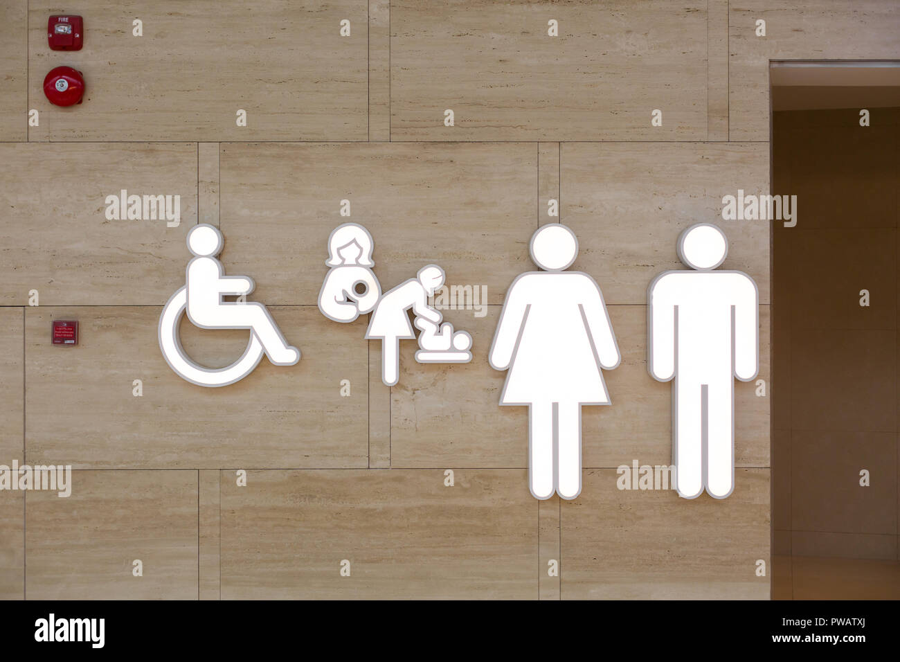 Toilet symbols at Singapore Changi Airport. Stock Photo
