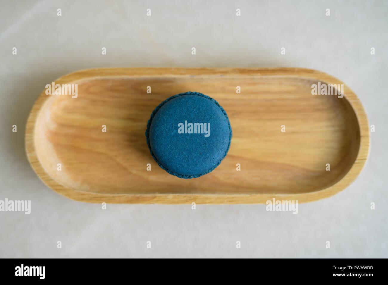 Directly Above Shot Of Blue Macaroon Served On Table Stock Photo