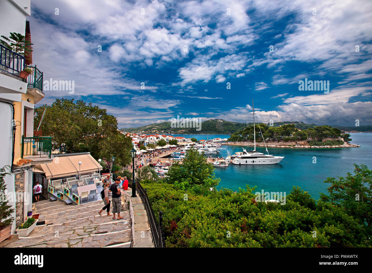 View of the Old Port of Skiathos town, Skiathos island, Northern Sporades, Greece. To the right of the photo you can see the Bourtzi castle. Stock Photo