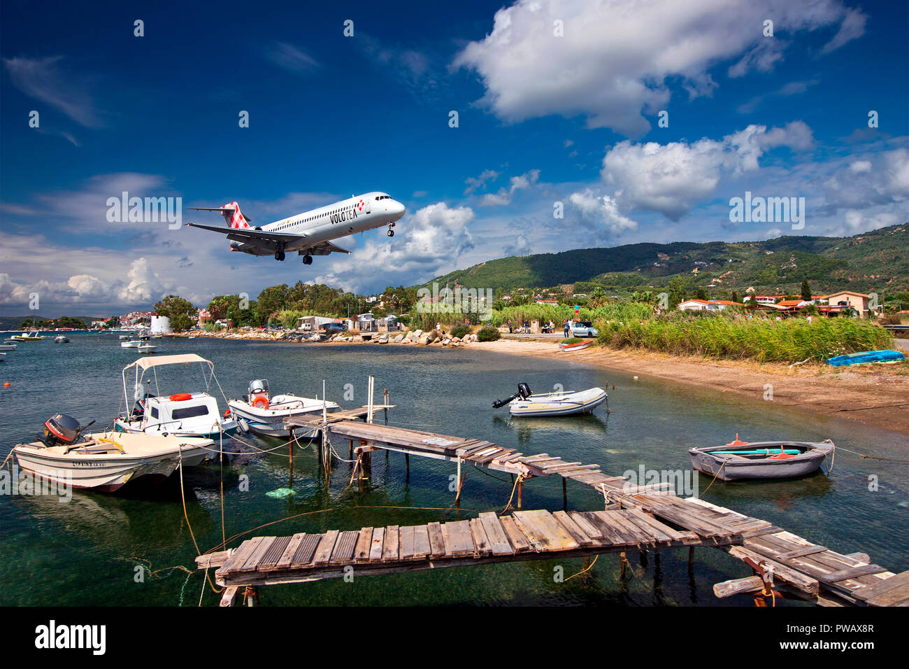 Airplane landing at the airport of Skiathos island, North Sporades, Magnesia, Thessaly, Greece Stock Photo