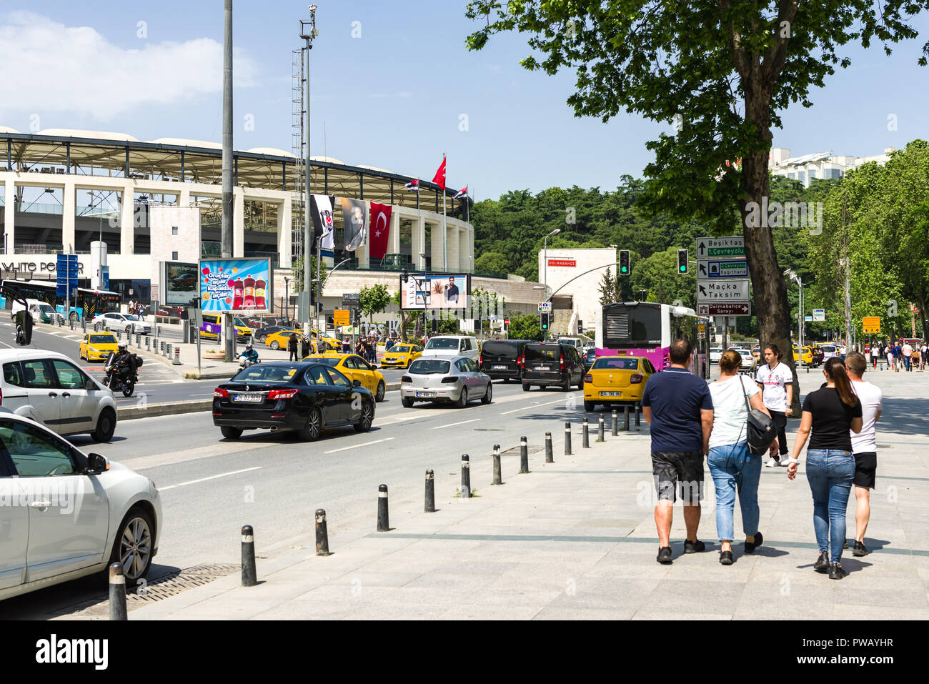 Traffic drives past BJK Vodafone Park, home of Beşiktaş JK football team, on a sunny Spring day, Istanbul, Turkey Stock Photo