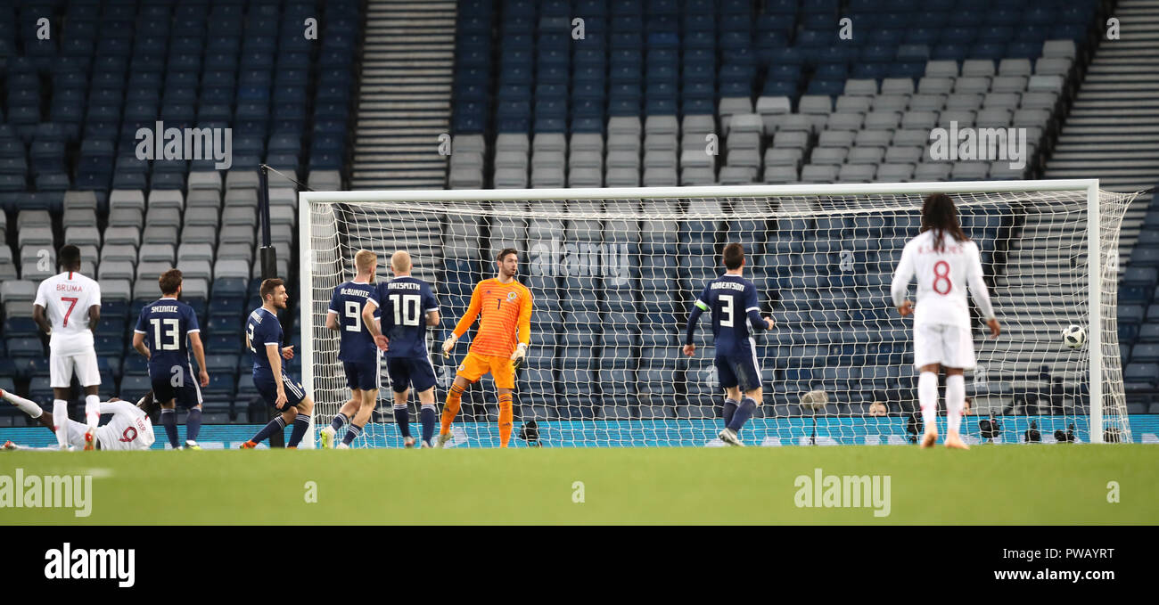 Portugal's Eder (left) scores his side's second goal of the game during the International Friendly match at Hampden Park, Glasgow. Stock Photo