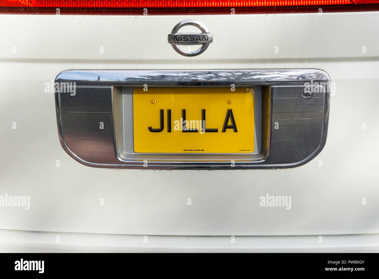 A personalised car number plate containing the woman's name Jill A. Stock Photo