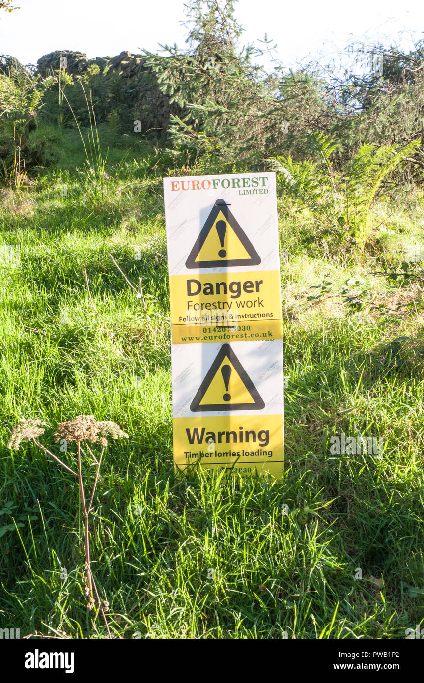 Warning sign of timber being loaded onto lorries. Beacon Fell Country Park. Lancashire. Stock Photo