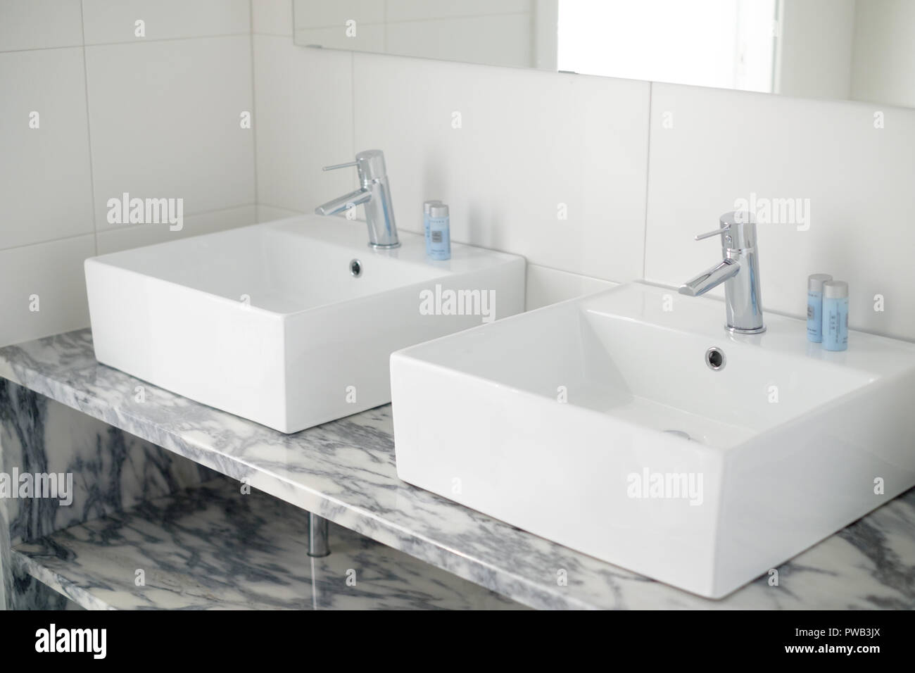 Bathroom with double his and hers basins Stock Photo