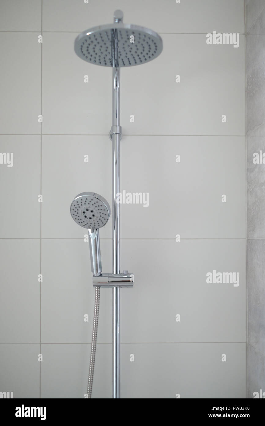 Stainless steel shower head with modern contemporary design Stock Photo