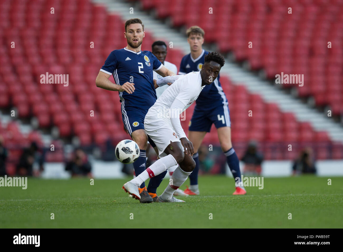 Hampden Park, Glasgow, UK. 14th Oct, 2018. International Football Friendly, Scotland versus Portugal; Eder of Portugal challenges for the ball with Stephen O'Donnell of Scotland Credit: Action Plus Sports/Alamy Live News Stock Photo