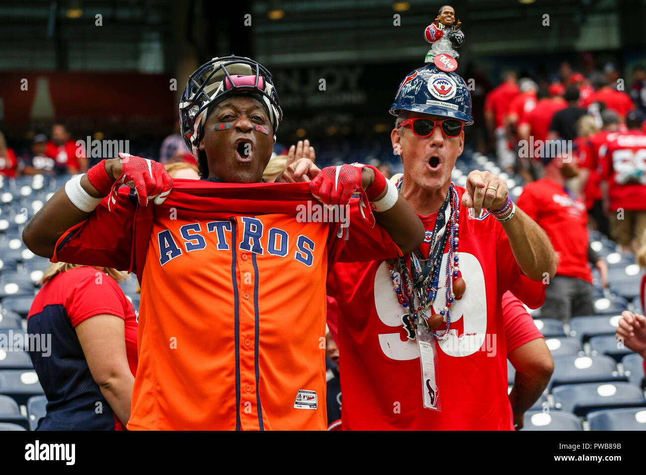 Houston, TX, USA. 14th Oct, 2018. Houston Texans fans celebrate by showing  their Houston Astros jersey after the Texans win over the Buffalo Bills at  NRG Stadium in Houston, TX. John Glaser/CSM/Alamy