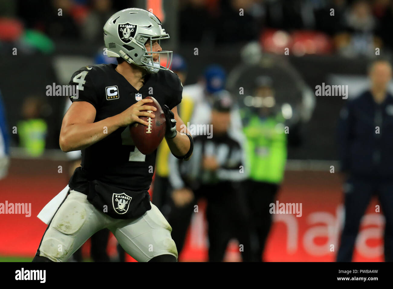 Wembley Stadium, London, UK. 14th Oct, 2018. NFL in London, game one, Seattle Seahawks versus Oakland Raiders; Quarterback Derek Carr of the Oakland Raiders Credit: Action Plus Sports/Alamy Live News Stock Photo
