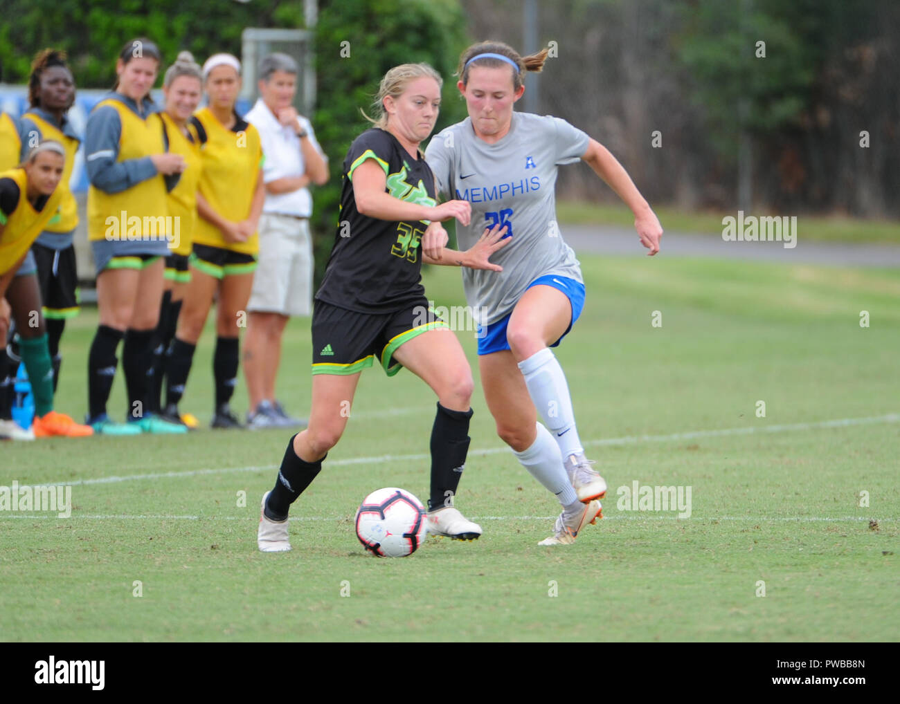 Memphis, TN, USA. 14th Oct, 2018. Central Florida midfielder, SYDNEY NASELLO (35), and Memphis Tigers defender, STASIA MALLIN (26), battle for ball control, during the NCAA soccer game between the Memphis Tigers and the South Florida Bulls at Mike Rose Soccer Complex in Memphis, TN. USF defeated Memphis, 2-0. Kevin Langley/CSM/Alamy Live News Stock Photo