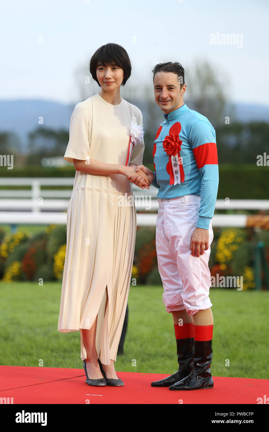 Kyoto Japan 14th Oct 18 R L Christophe Lemaire Haru Horse Racing Jockey Christophe Lemaire Poses With Presenter Haru During The Victory Ceremony After Riding Almond Eye To Win The Shuka Sho