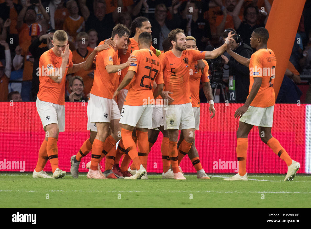 The Dutch players cheer over the goal to make it 20 for the