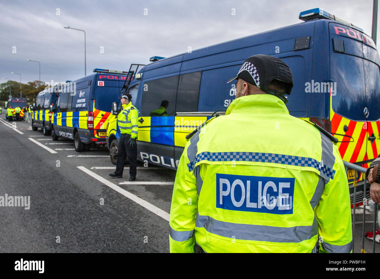 Blackpool, Lancashire, UK. 15th Oct, 2018. Heavy Police presence in Little Plumpton as protestors gather to demonstrate against the start of Fracking operations for Shale Gas at the Caudrilla Exploration site. UK police surveillance of the Fracking is due to commence after the last legal challenge to prevent operations failed at the Supreme Court, clearing the way for start of high pressure fluid cracking of the Bowland Shale. Credit: MediaWorldImages/Alamy Live News Stock Photo