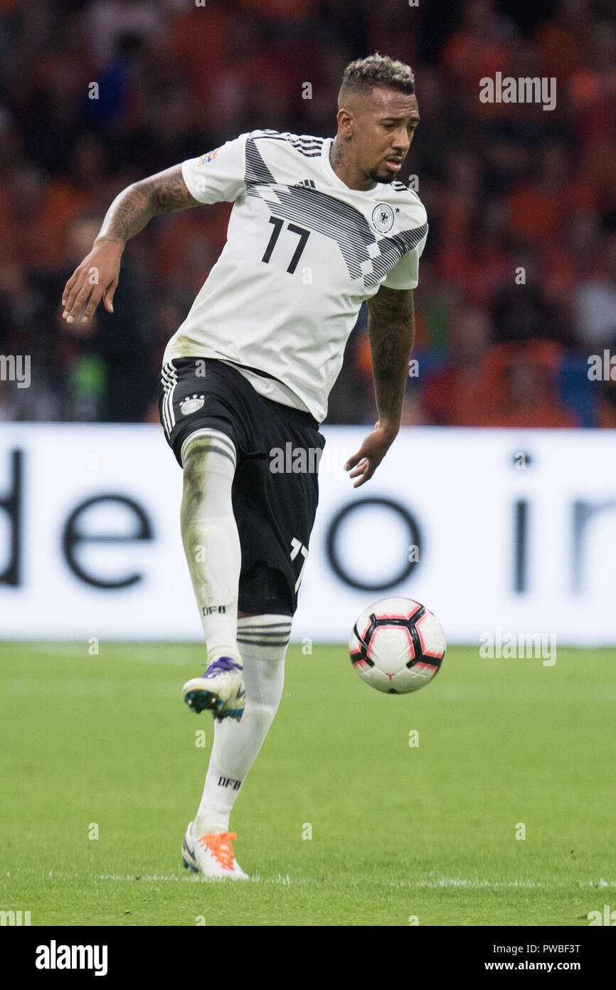 Jerome BOATENG (GER) with Ball, Single Action with Ball, Action, Full Character, Vertical, Soccer Laender, Nations League, Netherlands (NED) - Germany (GER) 3: 0, on Oct 13, 1818 at the Johan Cruyff Arena in Amsterdam/Netherlands. ¬ | usage worldwide Stock Photo