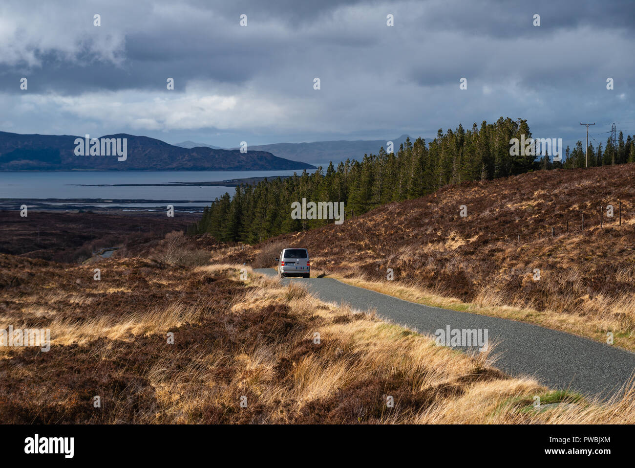 Curvy Country road through marshland ,leading toward Broadford, Isle of Skye, outer Hebrides,  Scotland, UK Stock Photo