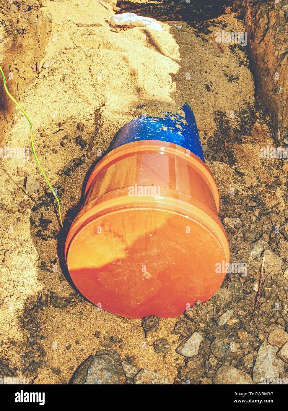 Laying of HDPE pipe underground of City portable water system. . Blue