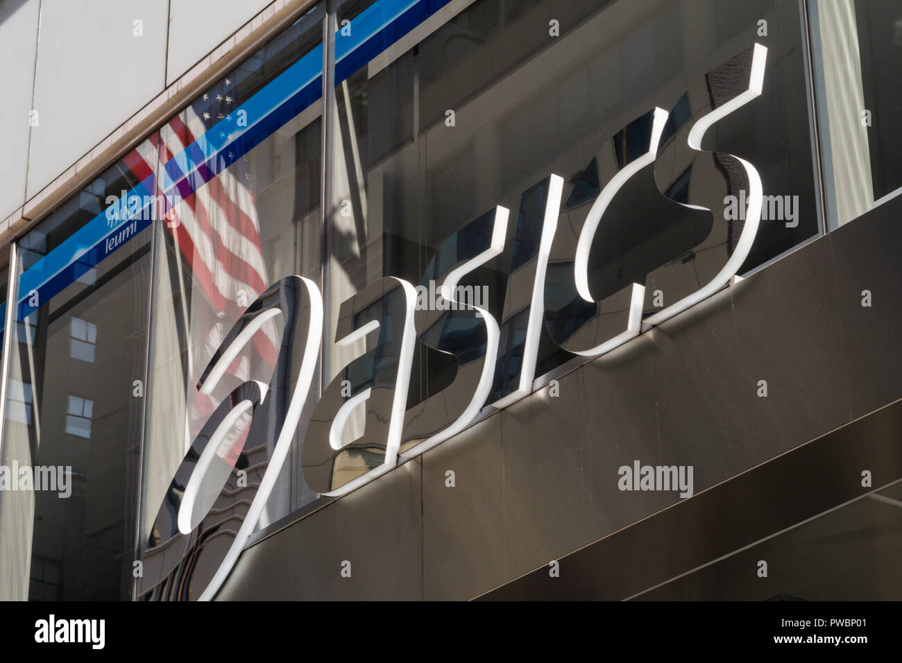 Asics Fifth Avenue flagship store sign, NYC, USA Stock Photo - Alamy