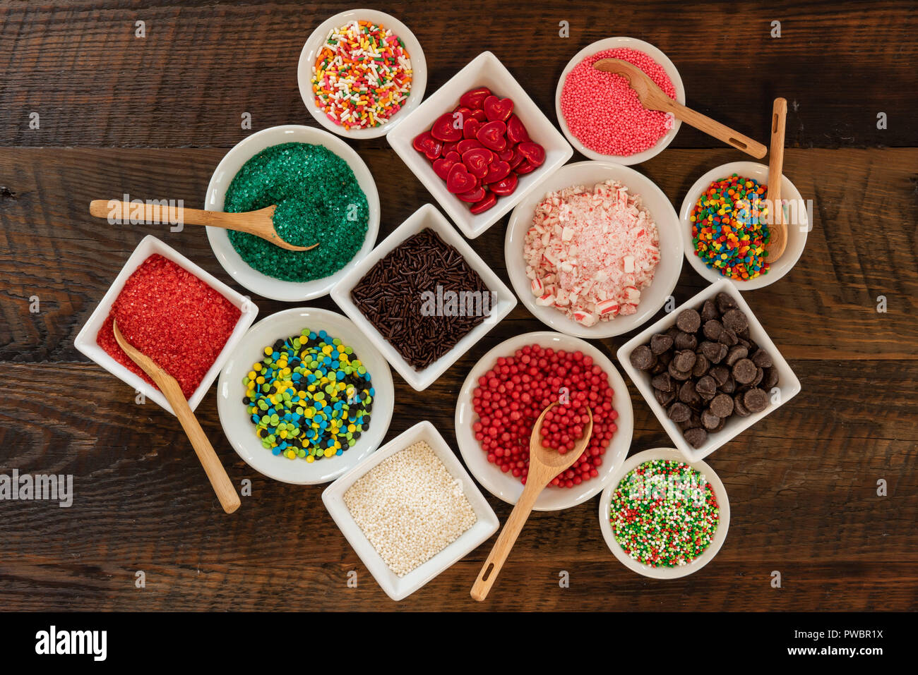 Spoons in Variety of Sprinkles Arranged in tight cluster Stock Photo