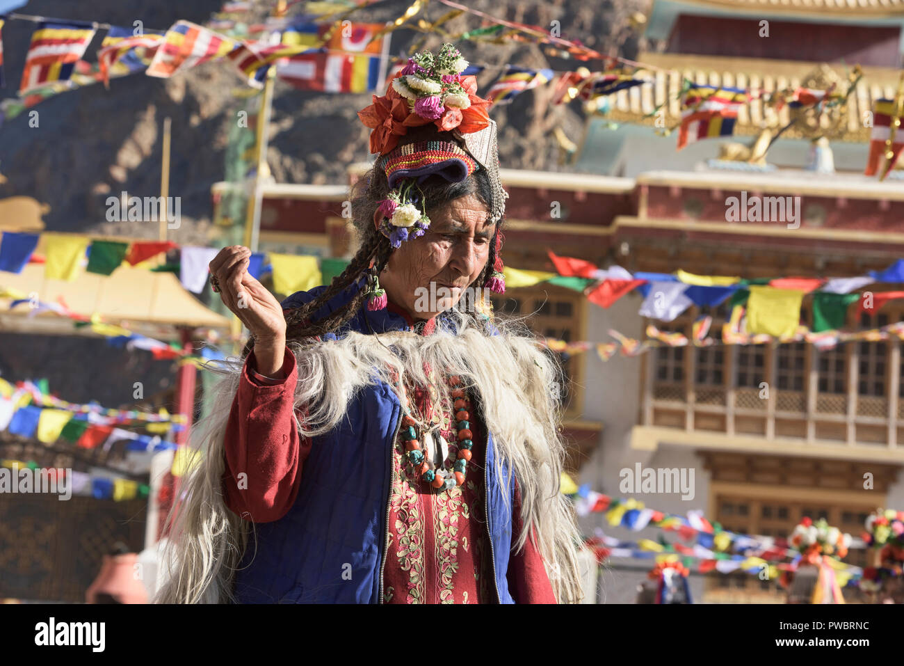Aryan (Brogpa) woman dancing at a traditional festival, Biama village ...