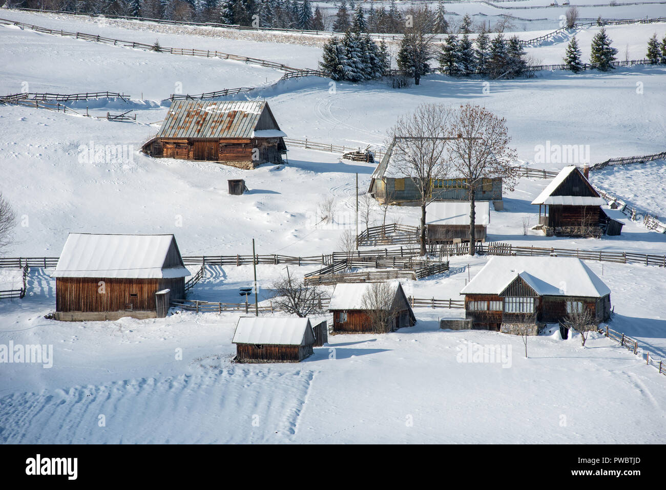 Winter mountain village landscape with snow covered houses Stock Photo ...