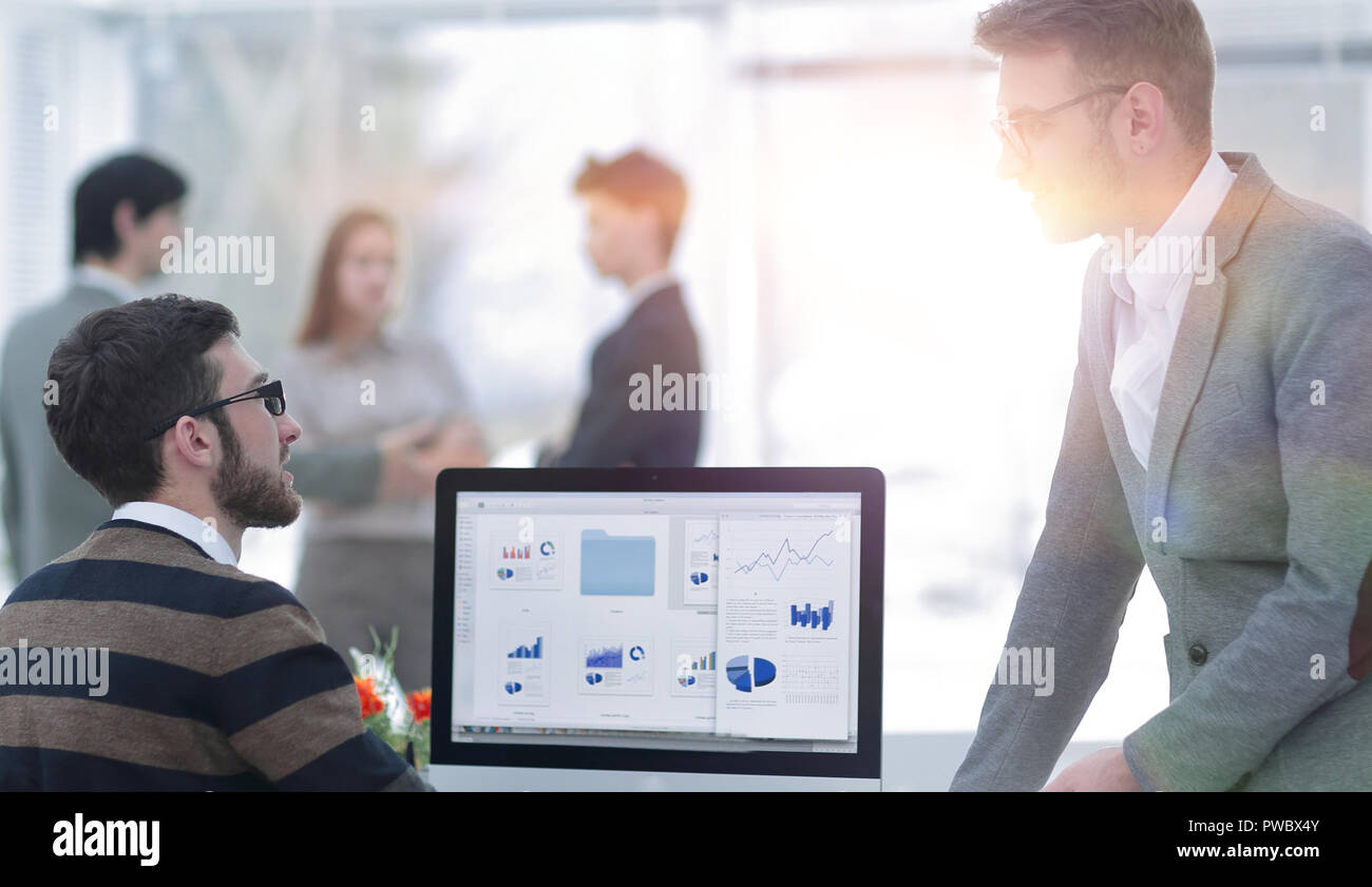 two businessmen analyzing stats financial data Stock Photo
