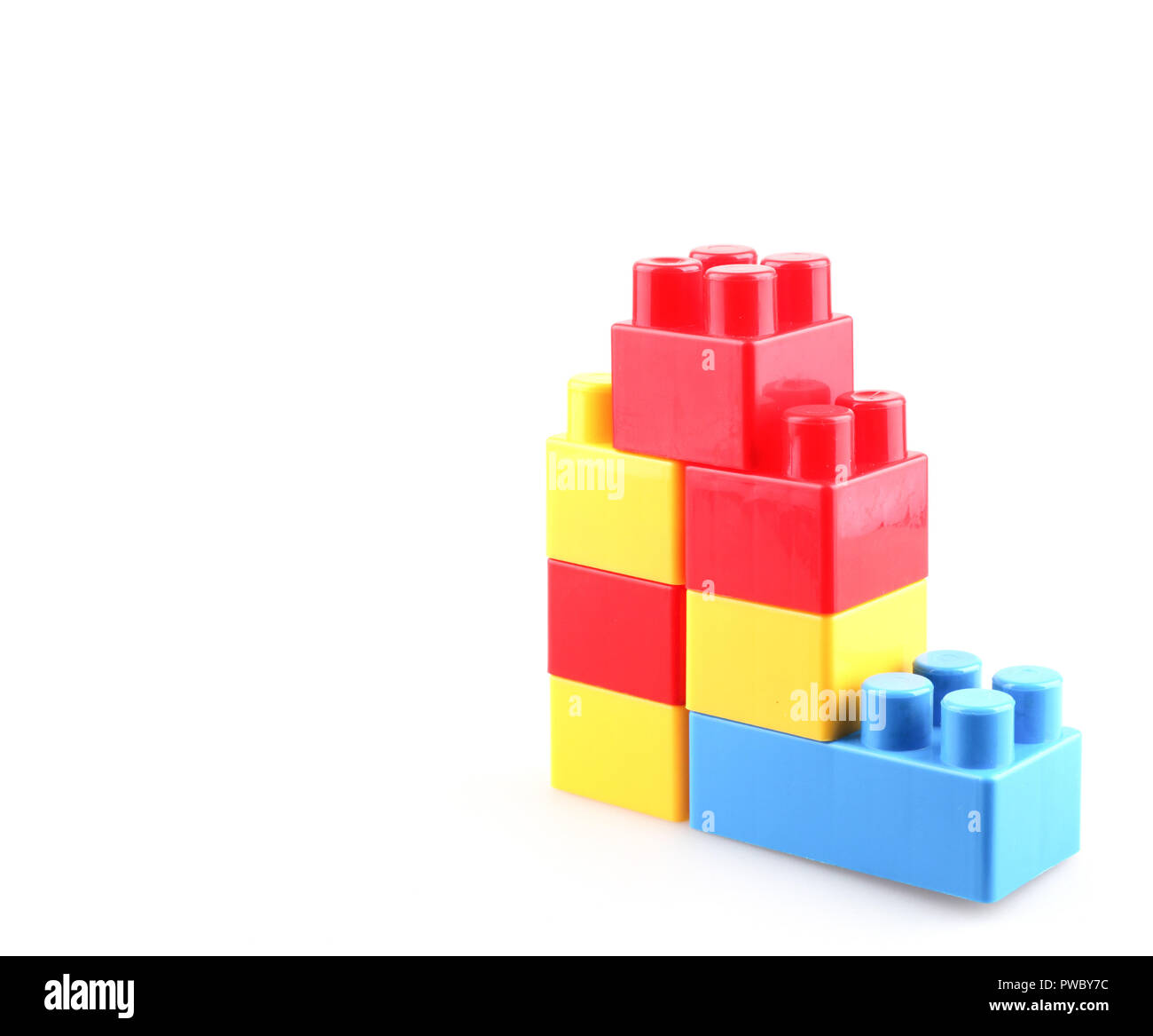 Plastic colorful toy blocks on white background Stock Photo - Alamy