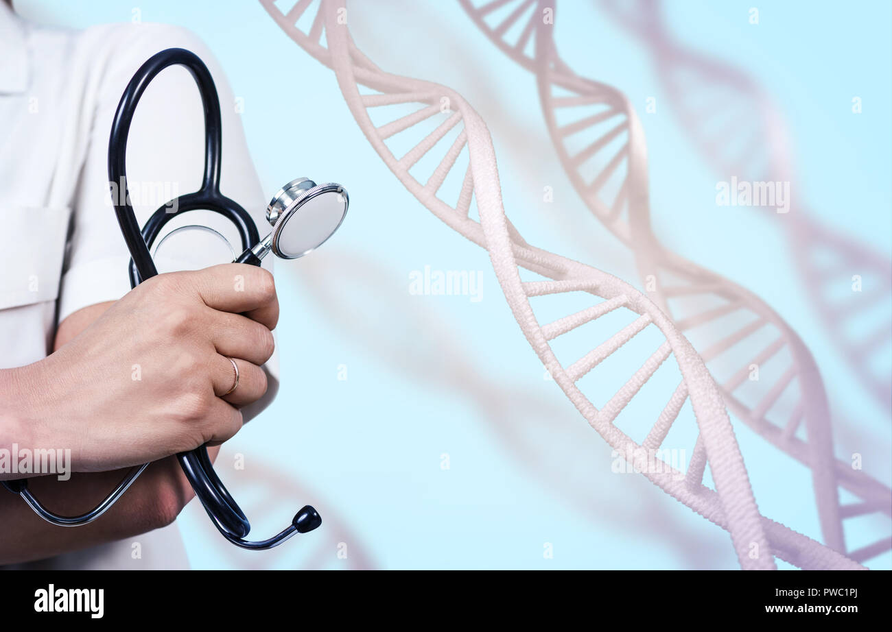 Doctors hands with stethoscope in laboratory among DNA chains. Stock Photo