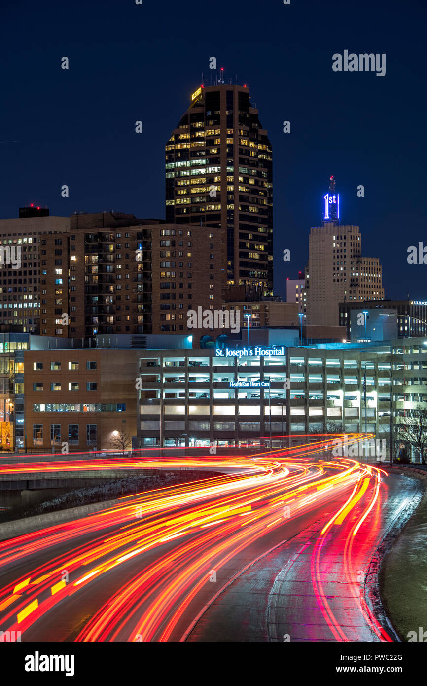 Saint Paul, Minnesota skyline at night with flowing traffic lights on Interstate 94 in the foreground. Stock Photo