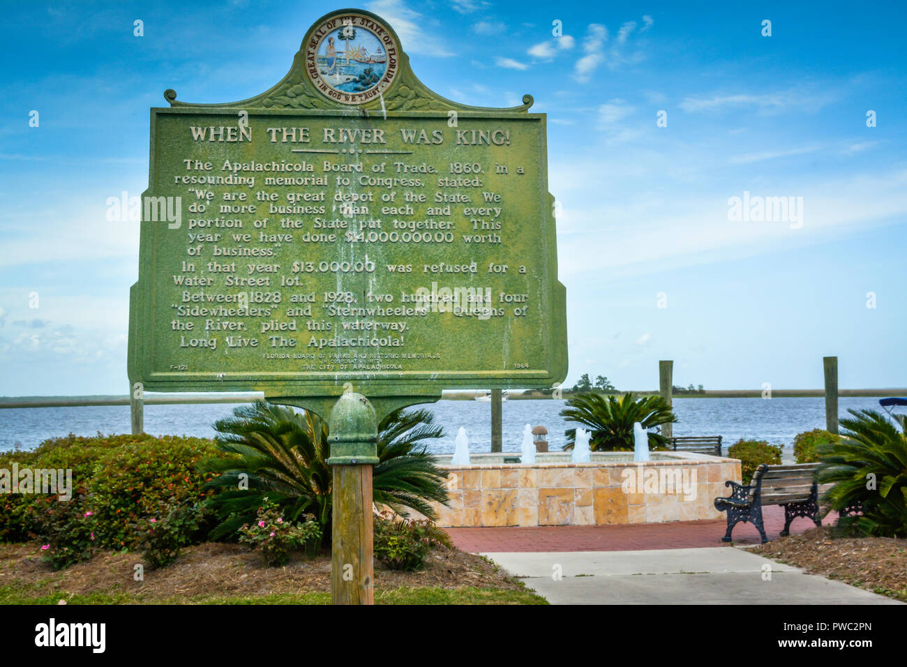 Apalachicola in the Florida Panhandle offers many restaurants & shopping outlets, and this historical plaque memorialized the Apalachicola waterways Stock Photo