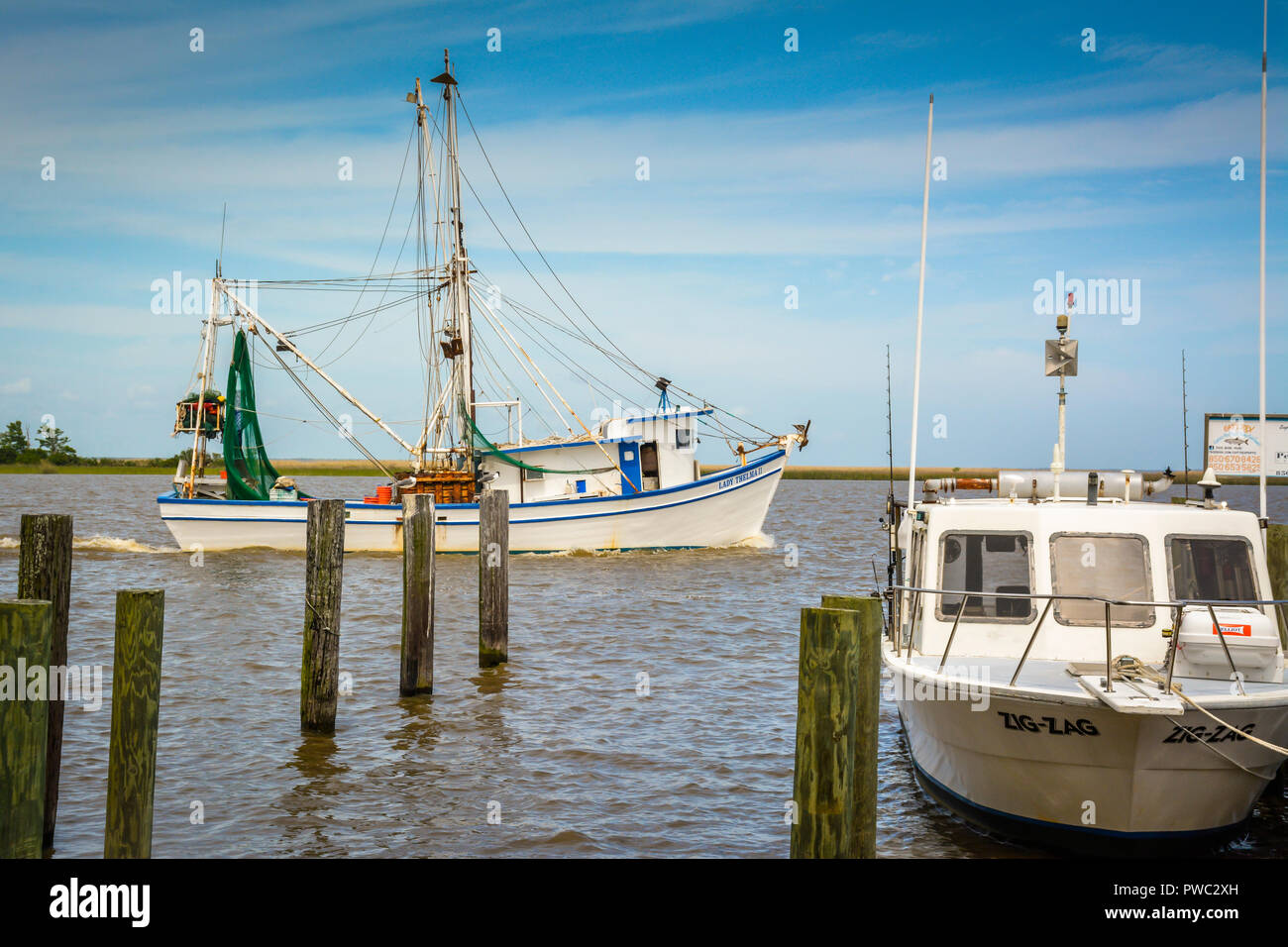 Fishing and tourist boats anchor and moor around the marina and docks