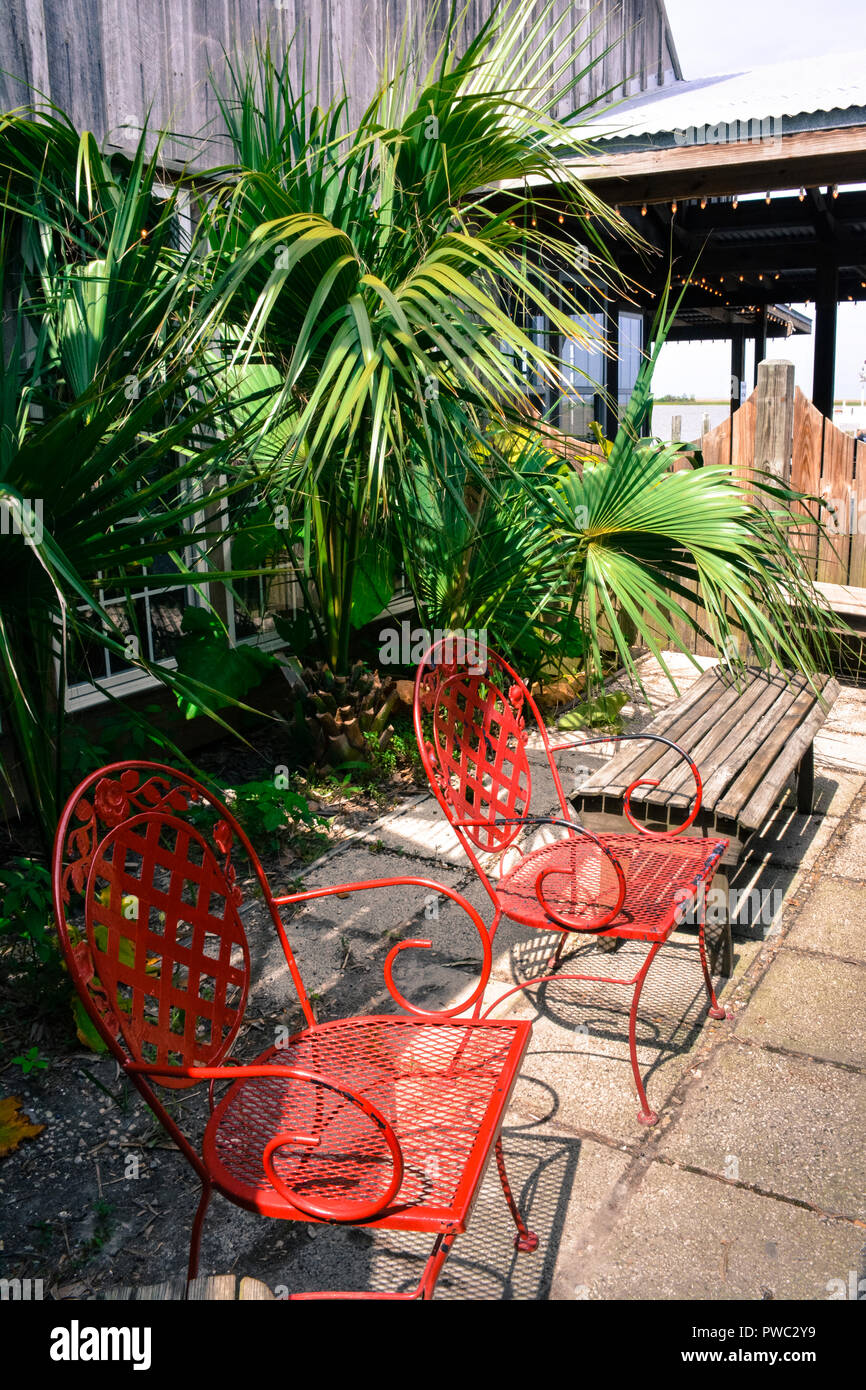 Waiting area for the Seafood Oyster Boss restaurant in Apalachicola, in the Florida Panhandle enjoys the coastal lifestyle of Old Florida Stock Photo
