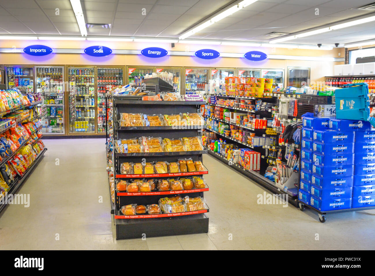 Interior Of Generic Convenience Market With Aisles Of Snack Foods And