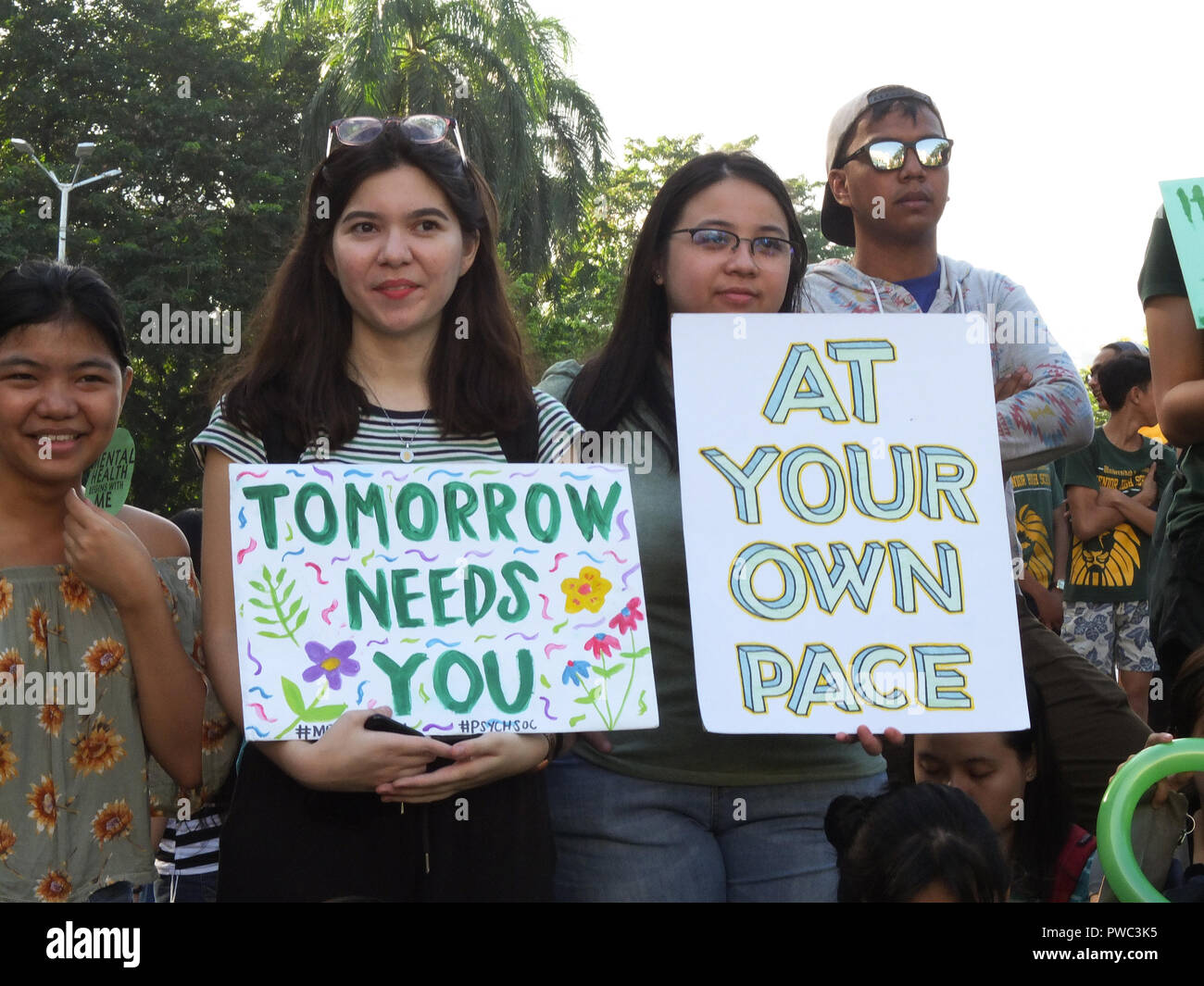 Manila, Philippines. 14th Oct, 2018. Students with different placards of quotable quotes at the Solidarity March in Manila. The Philippines holds the first-ever Solidarity Walk for Mental Health in Manila City on October 14. The march is organized in partnership with the Office of Senator Risa Hontiveros, and will also be held in commemoration of International Mental Health Month in October. Credit: Josefiel Rivera/Pacific Press/Alamy Live News Stock Photo