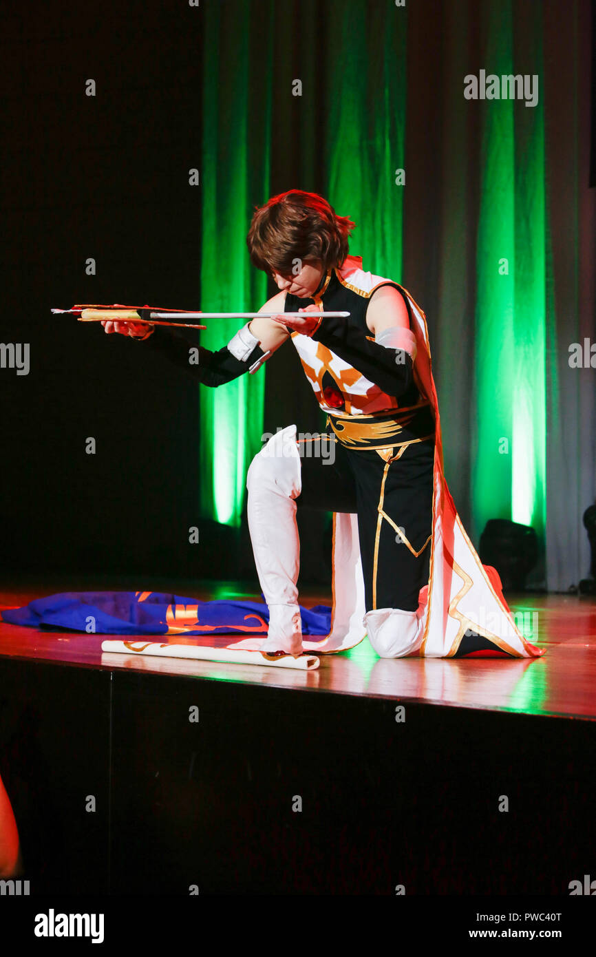 Frankfurt, Germany. 14th Oct, 2018. A participant performs on stage as Suzaku Kururugi from the anime series Code Geass. The 12. German Cosplay Championship was held as part of the 70th Frankfurt Book Fair 2018, with 24 participants competing on stage in costumes from different characters from anime, video games tv series and films. Credit: Michael Debets/Pacific Press/Alamy Live News Stock Photo