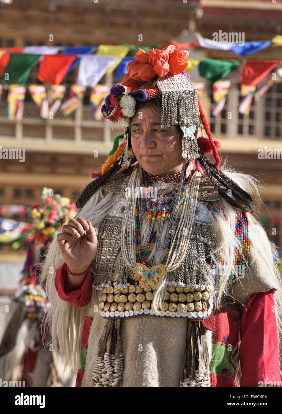 Aryan (Brogpa) woman dancing at a traditional festival, Biama village ...