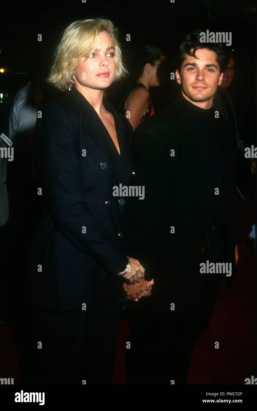 WESTWOOD, CA - OCTOBER 8: Actress Erika Eleniak and actor Billy Warlock attend Warner Bros. Pictures' 'Under Siege' Premiere on October 8, 1992 at Mann's Village Theater in Westwood, California. Photo by Barry King/Alamy Stock Photo Stock Photo