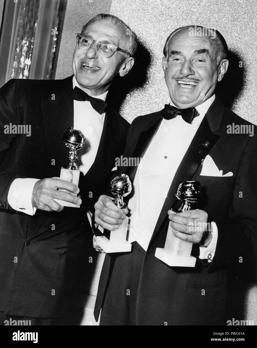 george cukor, jack l. warner,  golden globe awards for my fair lady, 1965 Stock Photo