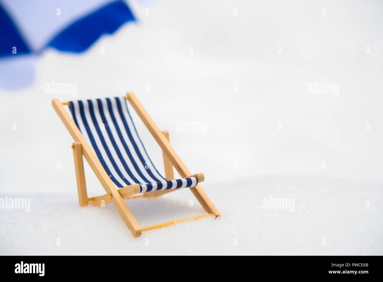 blue and white striped beach chair