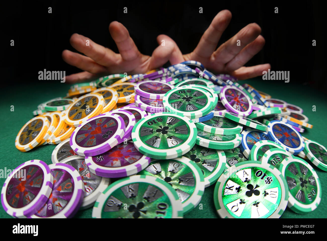 Poker chips hands pushing hires stock photography and images Alamy