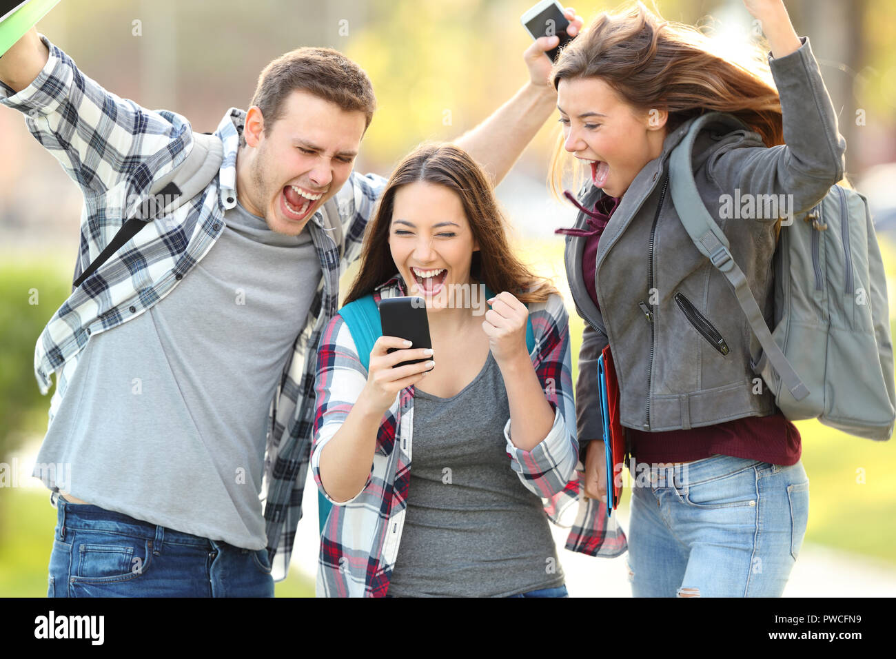 Students celebrating exam success hi-res stock photography and images ...