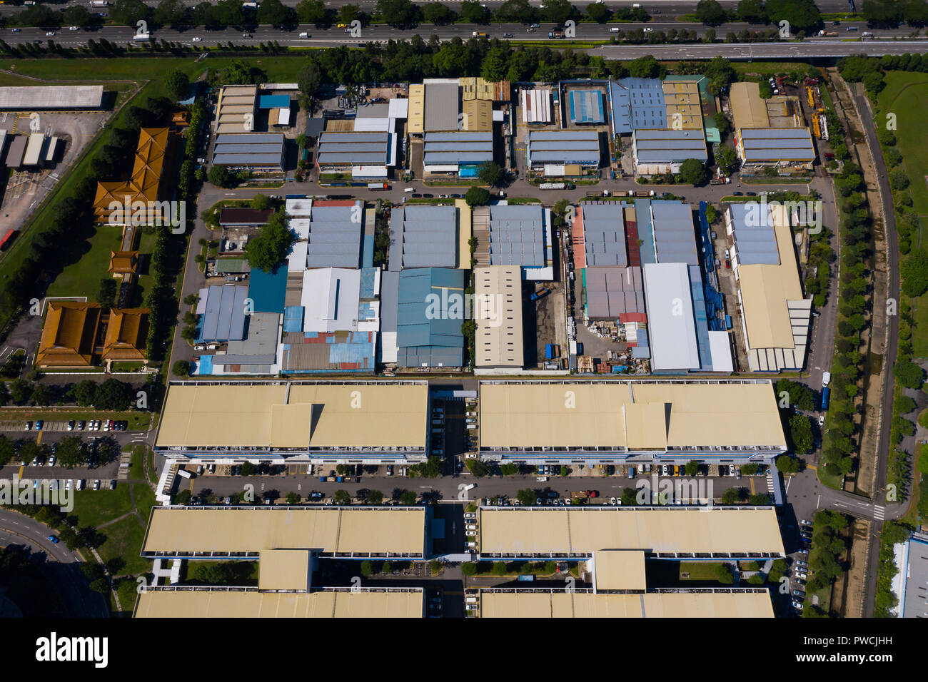 Aerial view of light industrial park in Singapore, generally made up of low rise buildings to house many small and medium size engineering business. Stock Photo