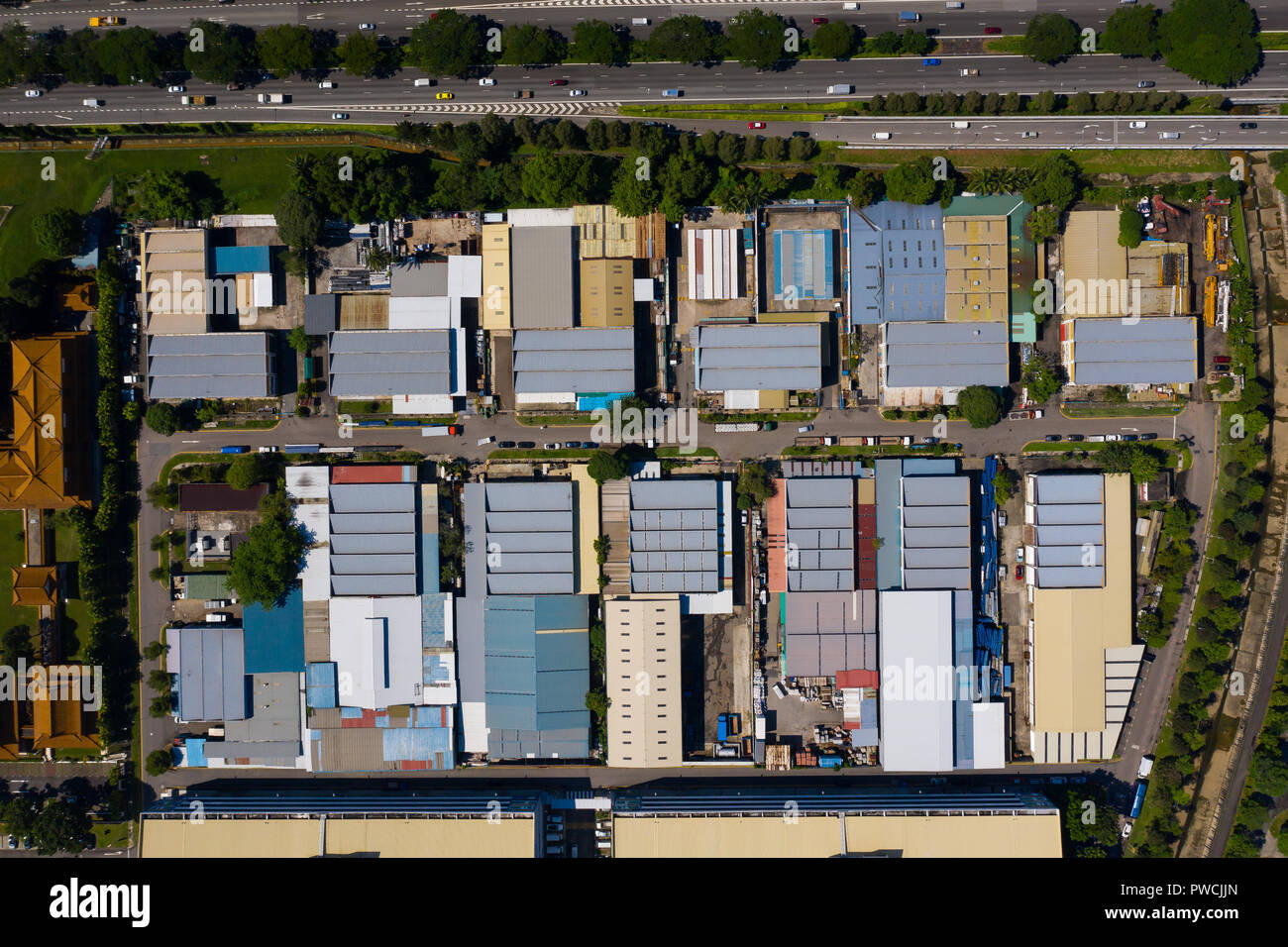 Aerial view of light industrial park in Singapore, generally made up of low rise buildings to house many small and medium size engineering business. Stock Photo
