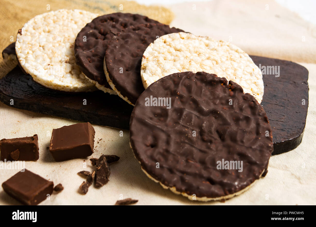 Chocolate covered corn plates snack dessert Stock Photo Alamy