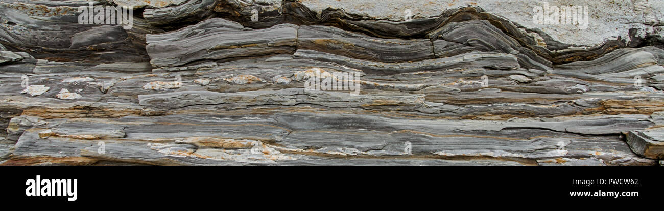 Rock showing multiple layers below it Stock Photo