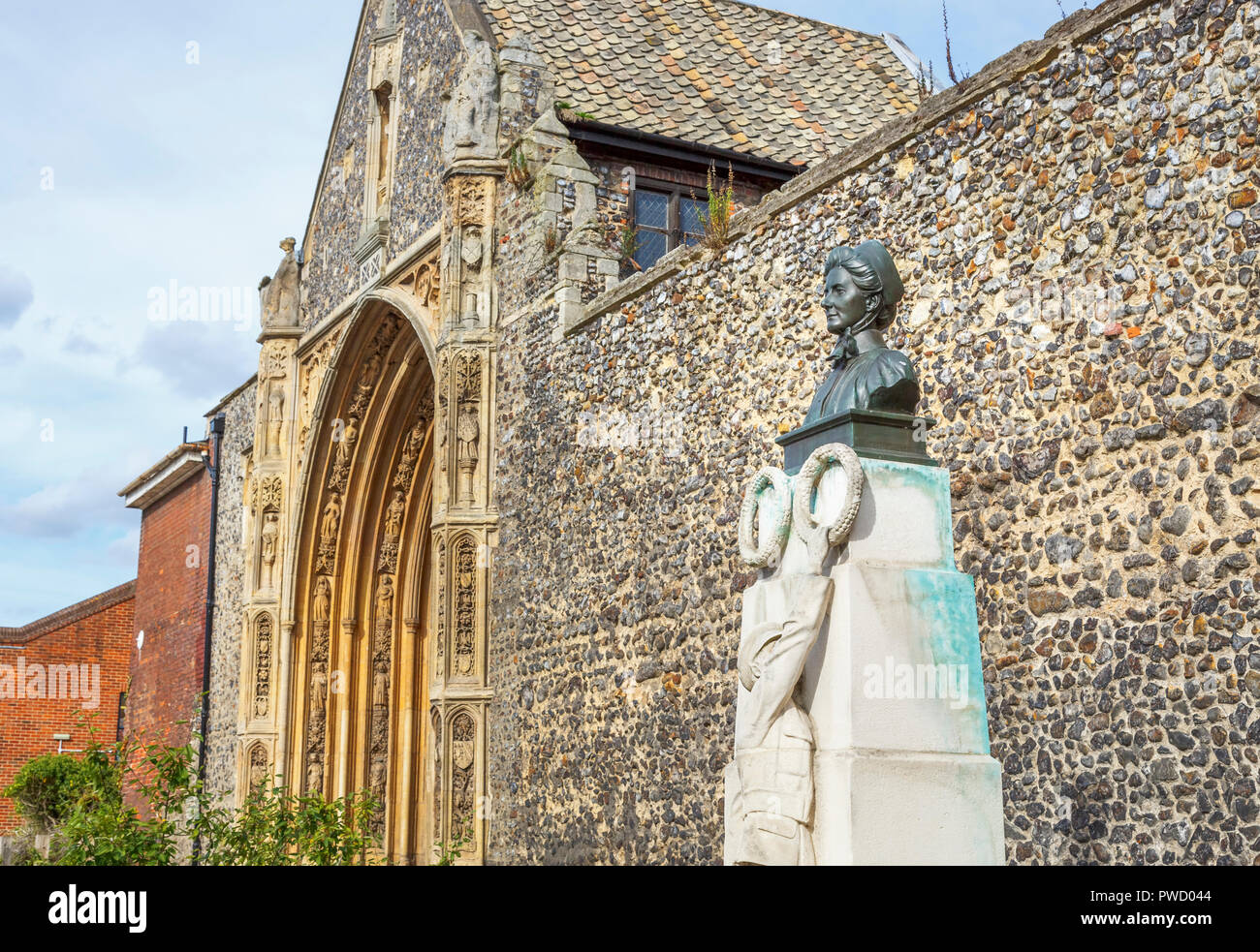 Memorial statue with head and shoulders bust of Edith Cavell, nurse