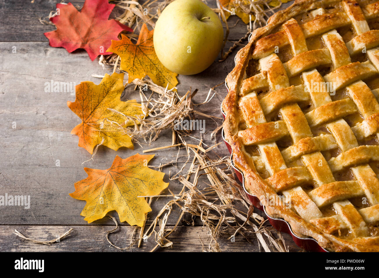 Homemade apple pie on wooden table. Top view. Copyspace Stock Photo