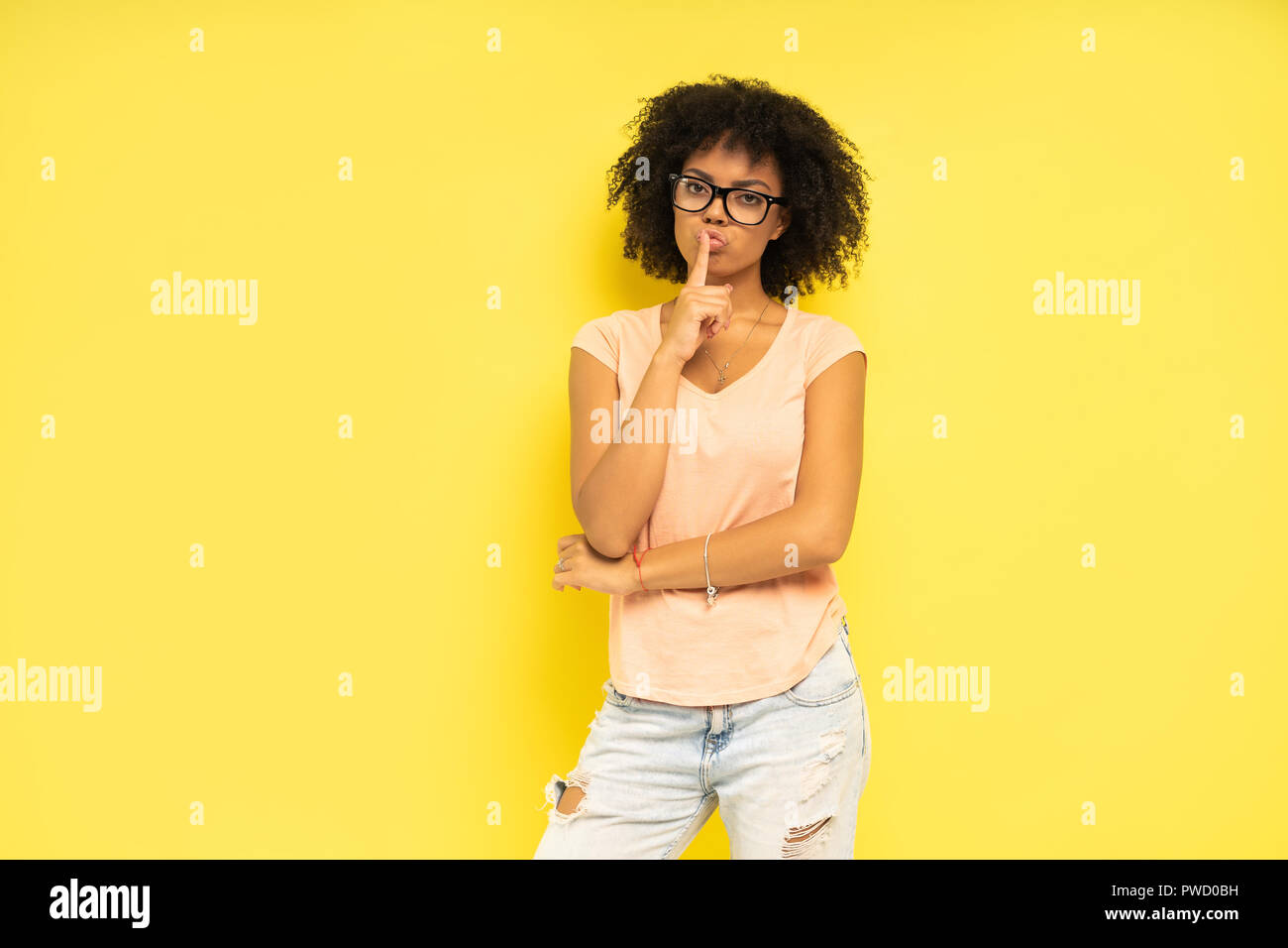 Beautiful african american female model posing in studio Stock Photo ...