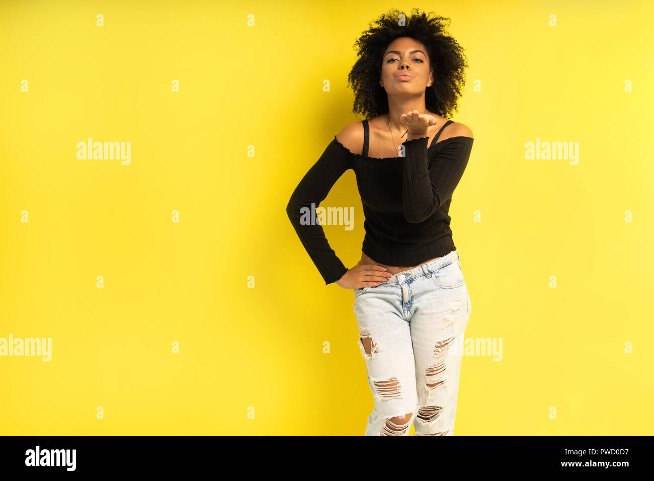 Beautiful african american female model posing in studio Stock Photo ...