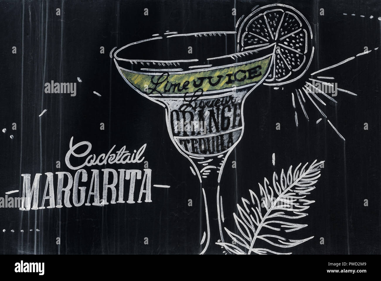 Margarita cocktail in vintage style drawing with chalk on blackboard