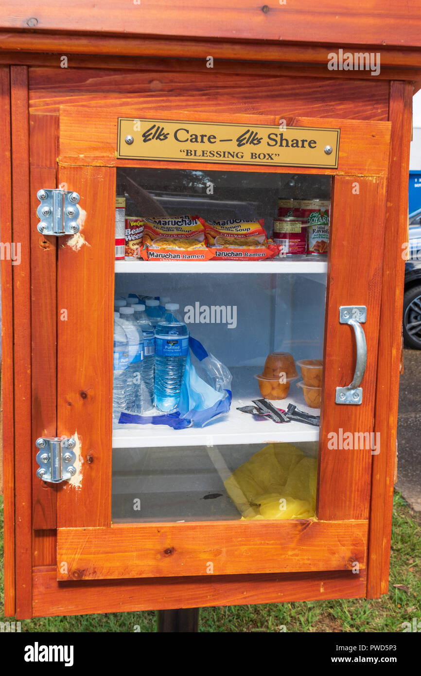 HICKORY, NC, USA-10/14/18: A 'blessing box' allows people to leave food and other staples for those who may need them. Stock Photo